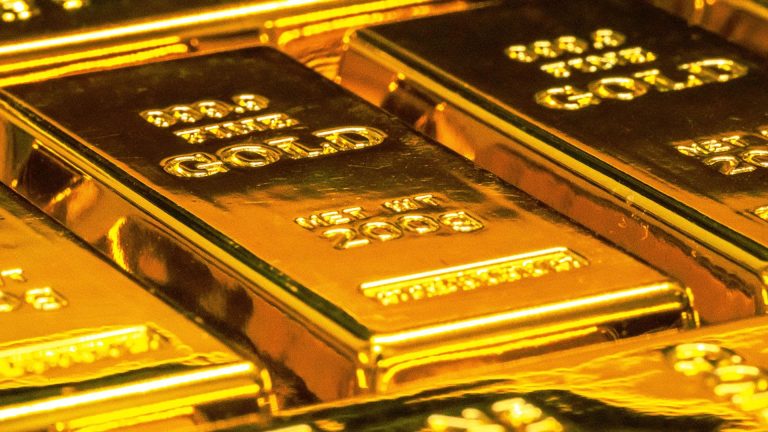 CDCROP: Gold bars stacked close up (Unsplash)