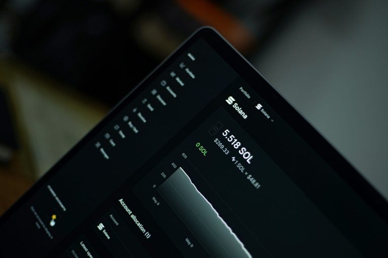 Solana portfolio shown on a laptop (Amjith S/Unsplash)