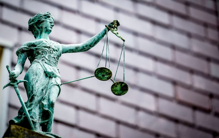 Scales of Justice (Getty Images/Caption Photo Gallery)