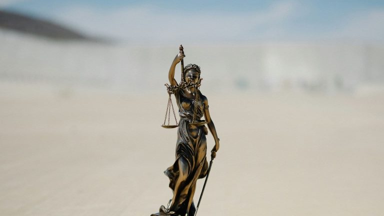 GenLayer is building an on-chain court system. (Credit: Unsplash, Wesley Tingey)