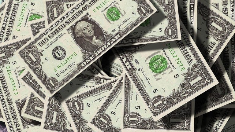 Scattered pile of $1 bills (Gerd Altmann/Pixabay)