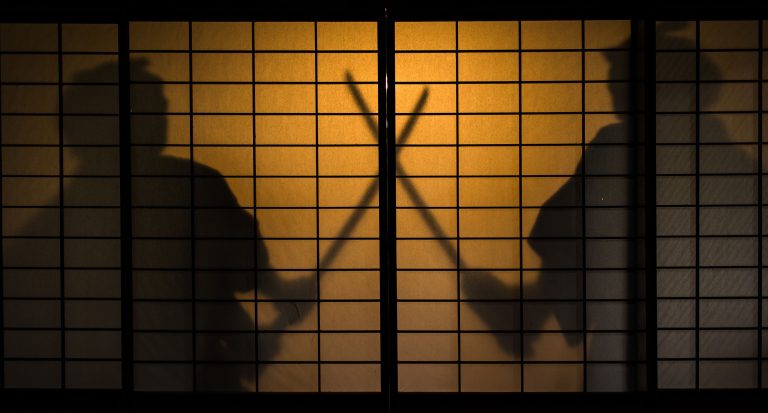 Silhouette of two samurai fighting (Getty Images/YS graphic)