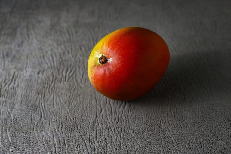 Mango on top of a table (Oscar Ivan Esquivel Arteaga/Unsplash)