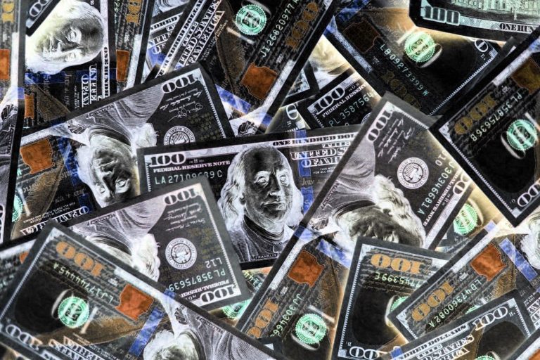 Dollars. (Unsplash, modified by CoinDesk)