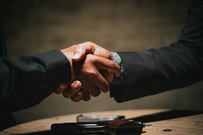 Handshake (Credit: Rock Staar, Unsplash)