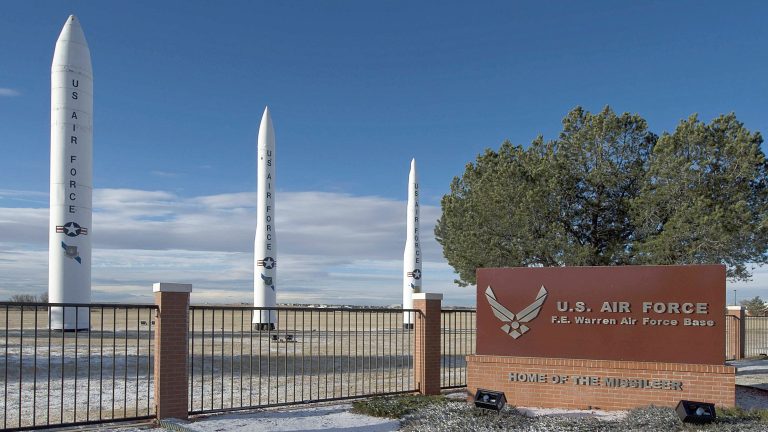 U.S. missiles stand near the fence of Warren Air Force Base