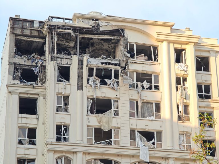 Missile-hit top floor of a building in Tehran after Israel's attack.