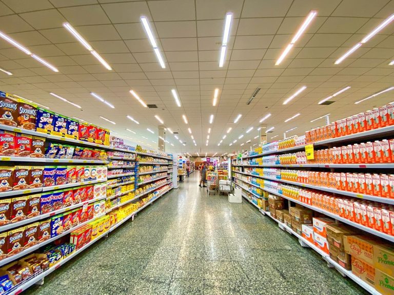 A supermarket aisle (Nathalia Rosa/Unsplash)