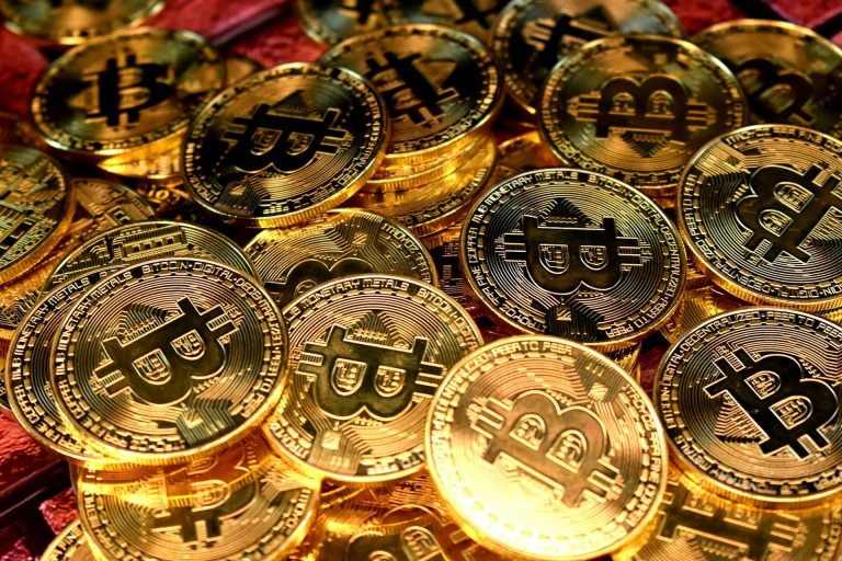 A pile of physical bitcoin tokens